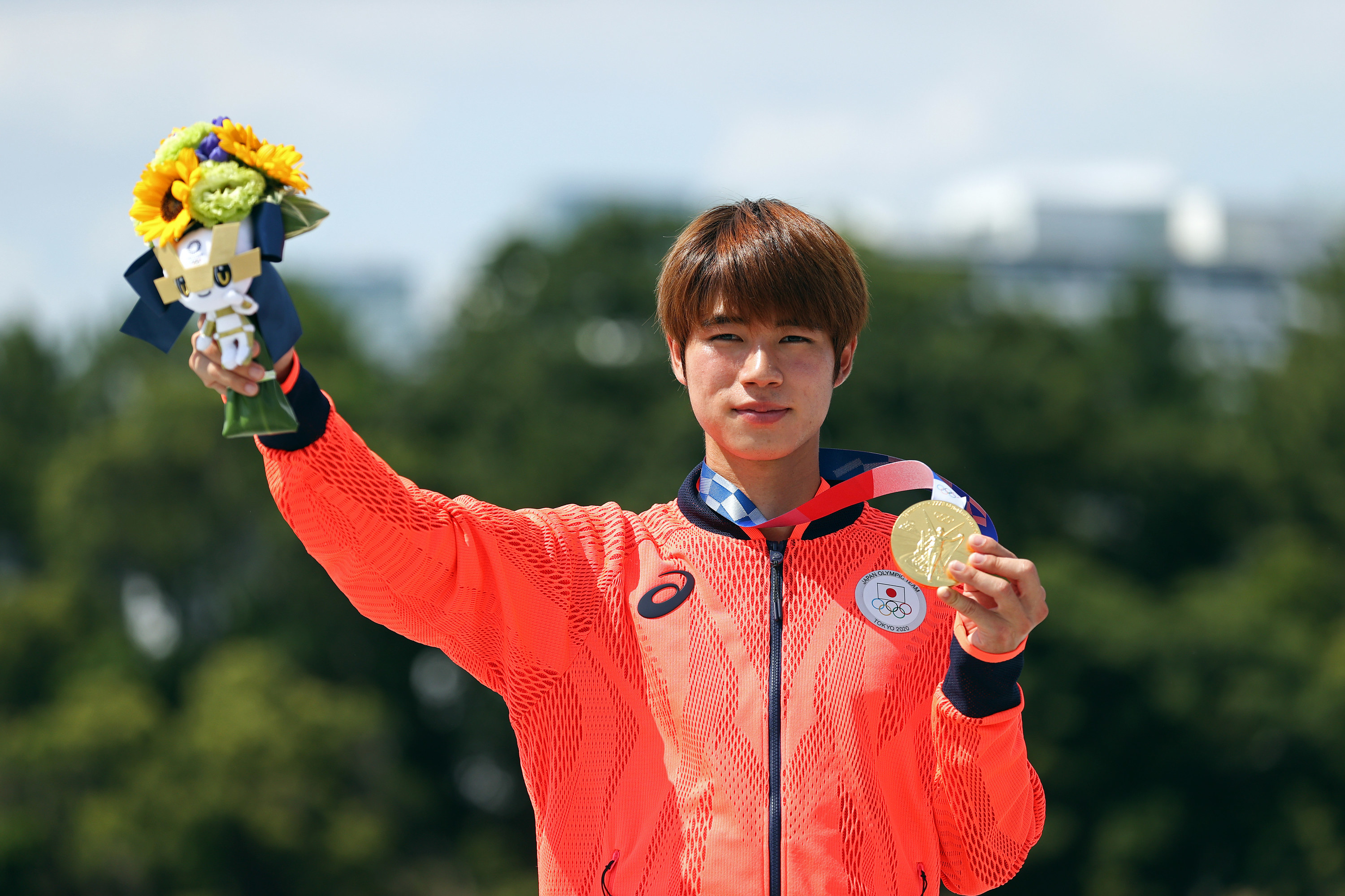 Yuto holds his gold medal