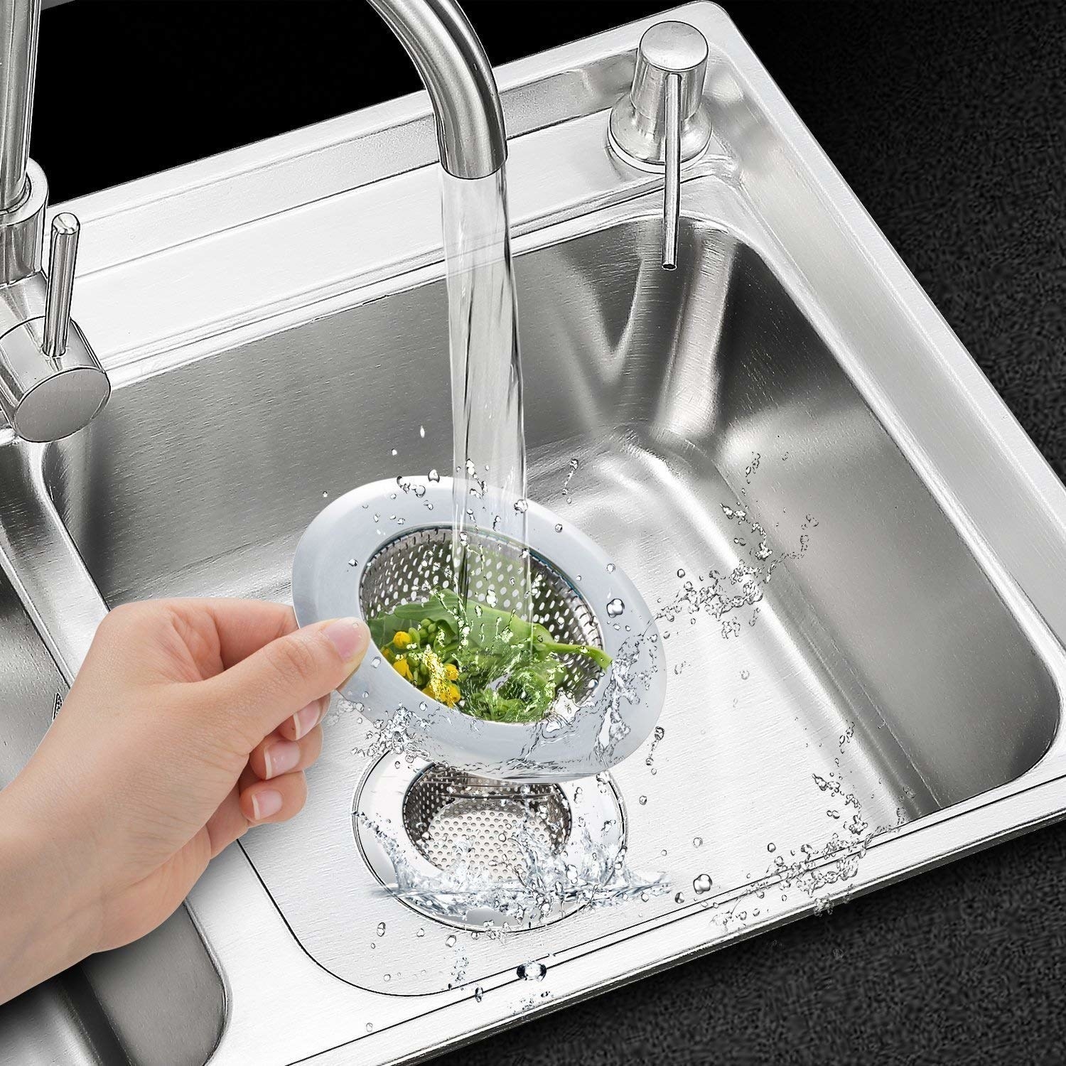 A person holding a stainless steel drainer with trash in it under a tap