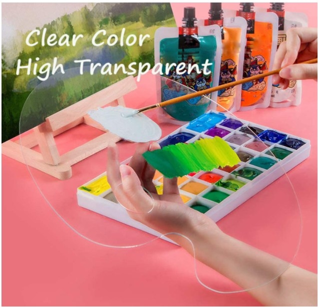 Foto de paleta de colores transparente con pintura sobre ella