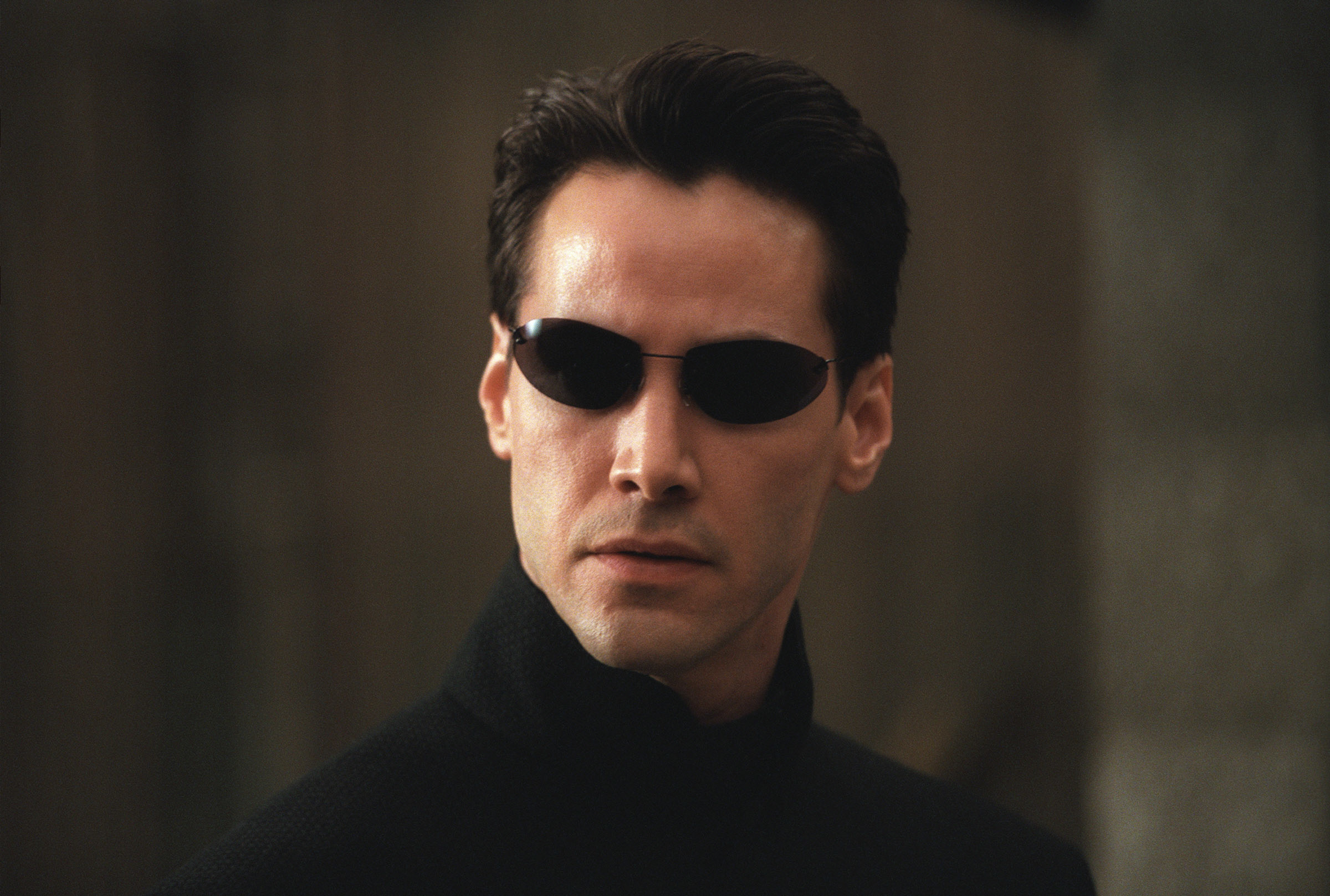 Keanu wearing dark sunglasses