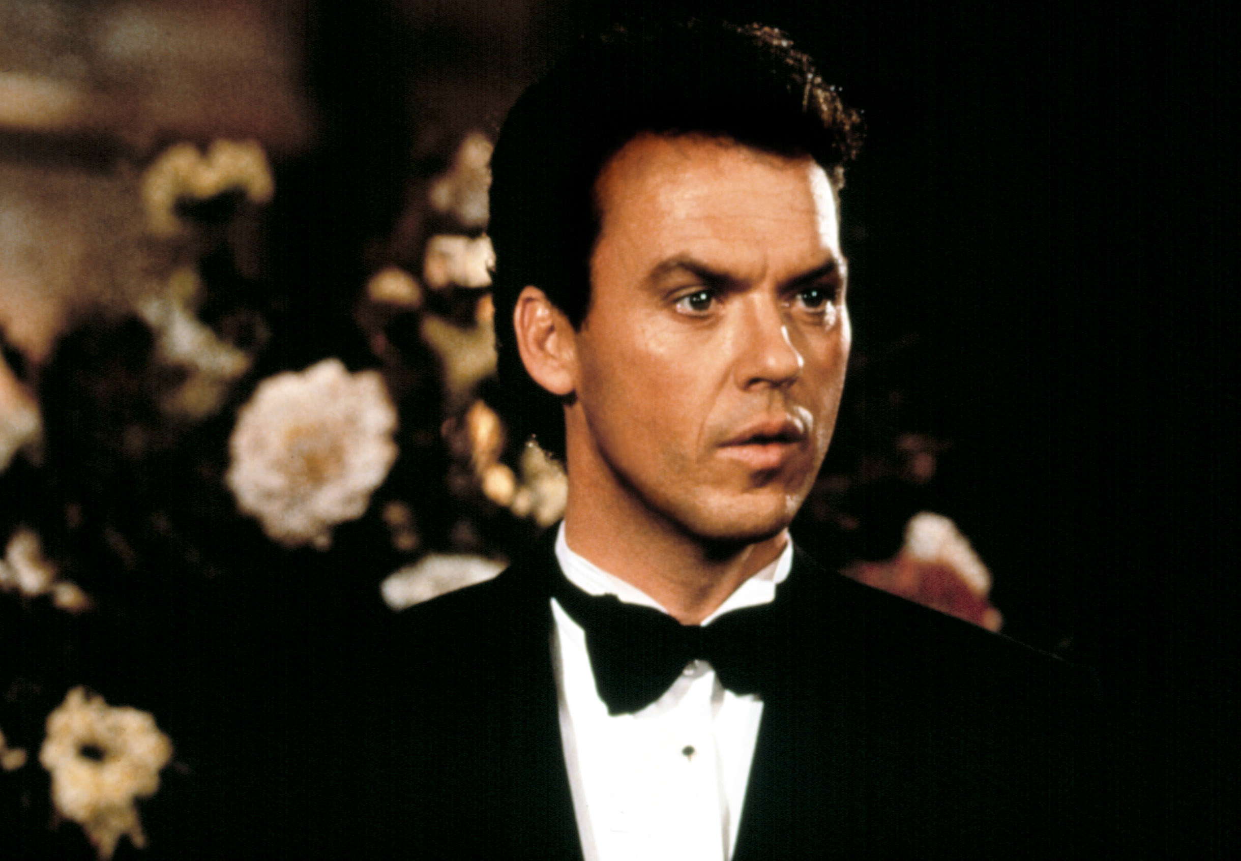 A young  MIchael Keaton in a bow tie