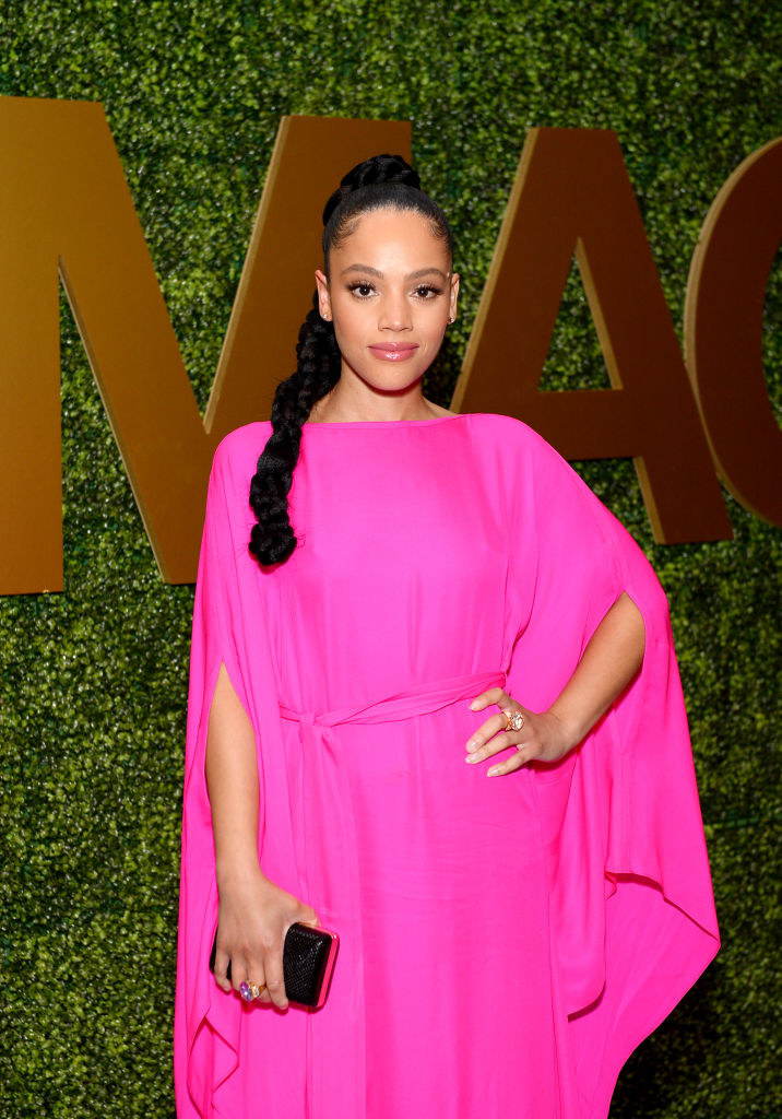 Bianca Lawson wears a bright pink dress to the MACRO Pre-Oscar Party 2020