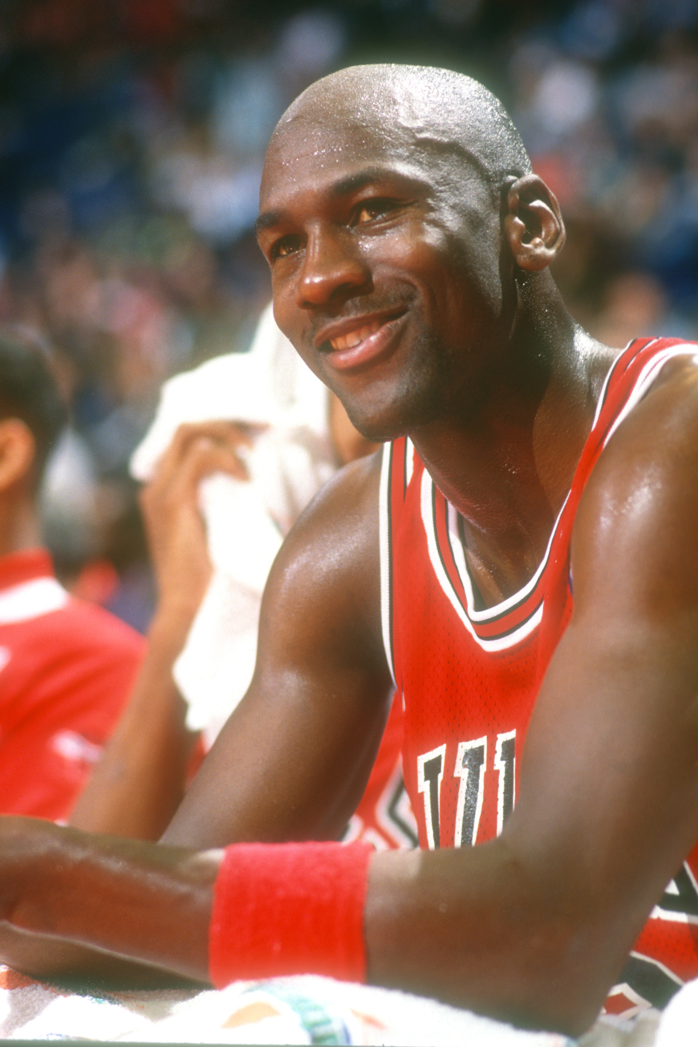 Michael Jordan smiles during a game