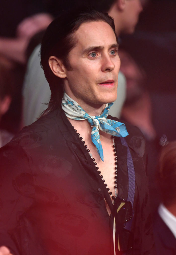 Jared Leto with a thin scarf around his neck