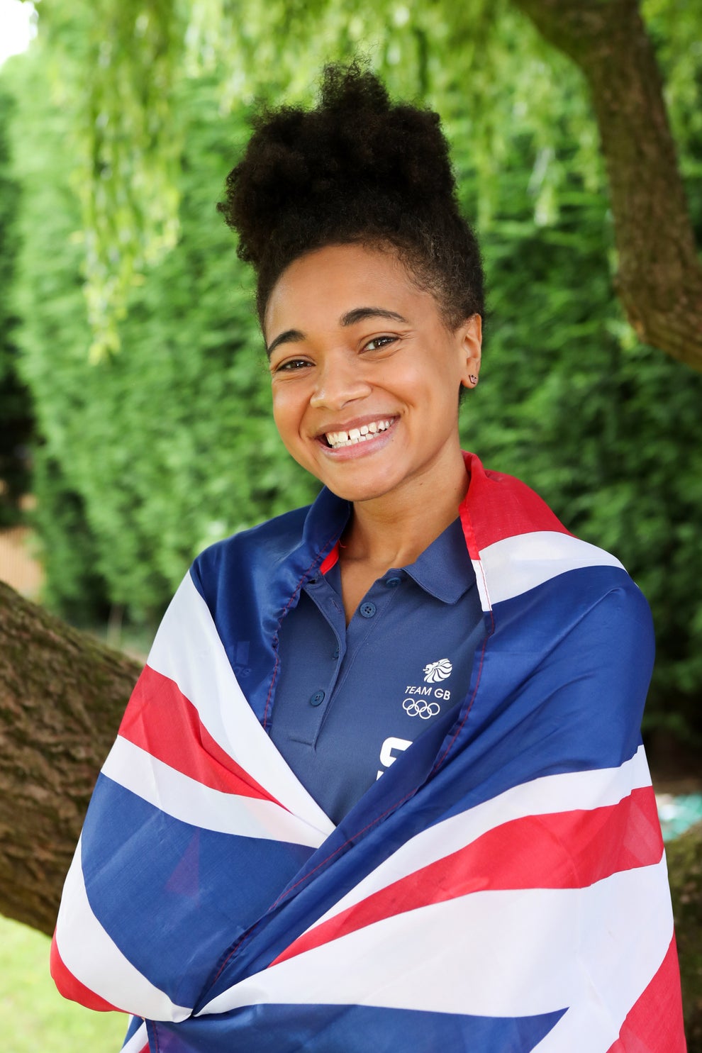 Great Britain's First Black Olympic Swimmer Wants Swimming Caps For Black Hair To Be Approved