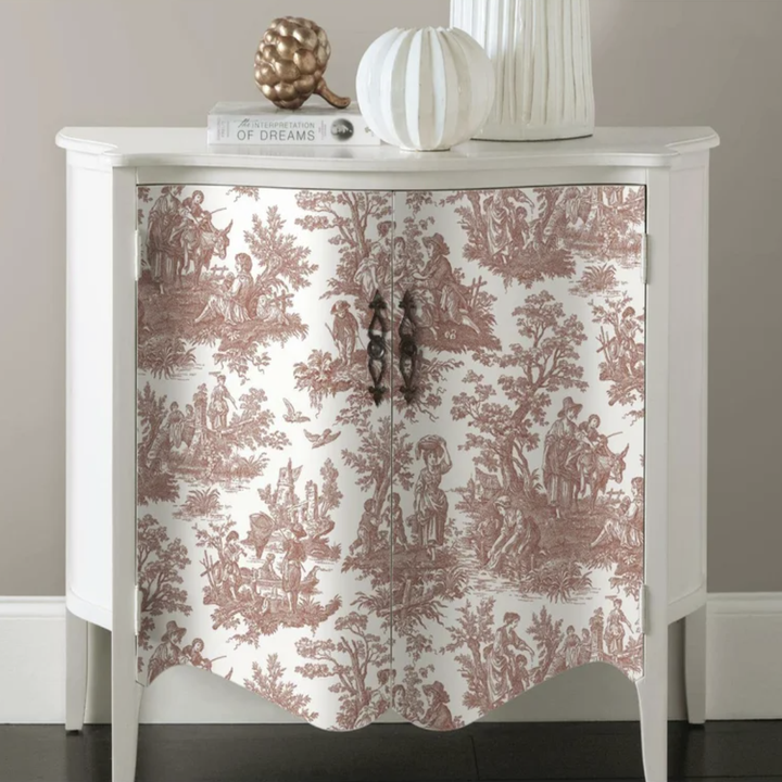 The wallpaper is used to cover the front of a nightstand