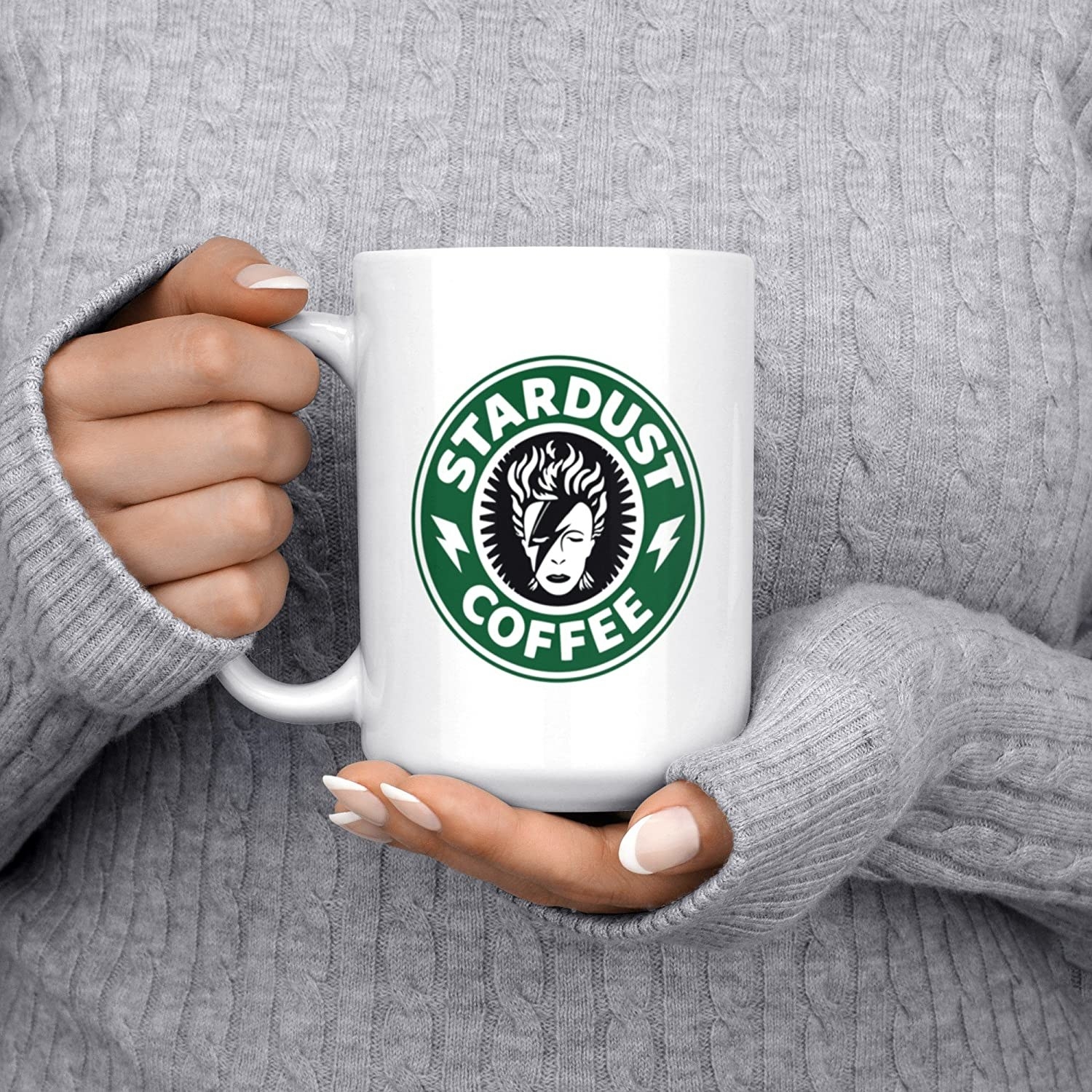 taza blanco con imagen de David Bowie imitando el logo de Starbucks
