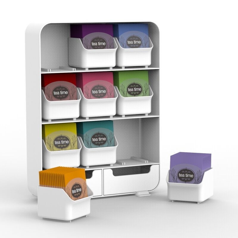 Holder displayed with teabags in each compartment