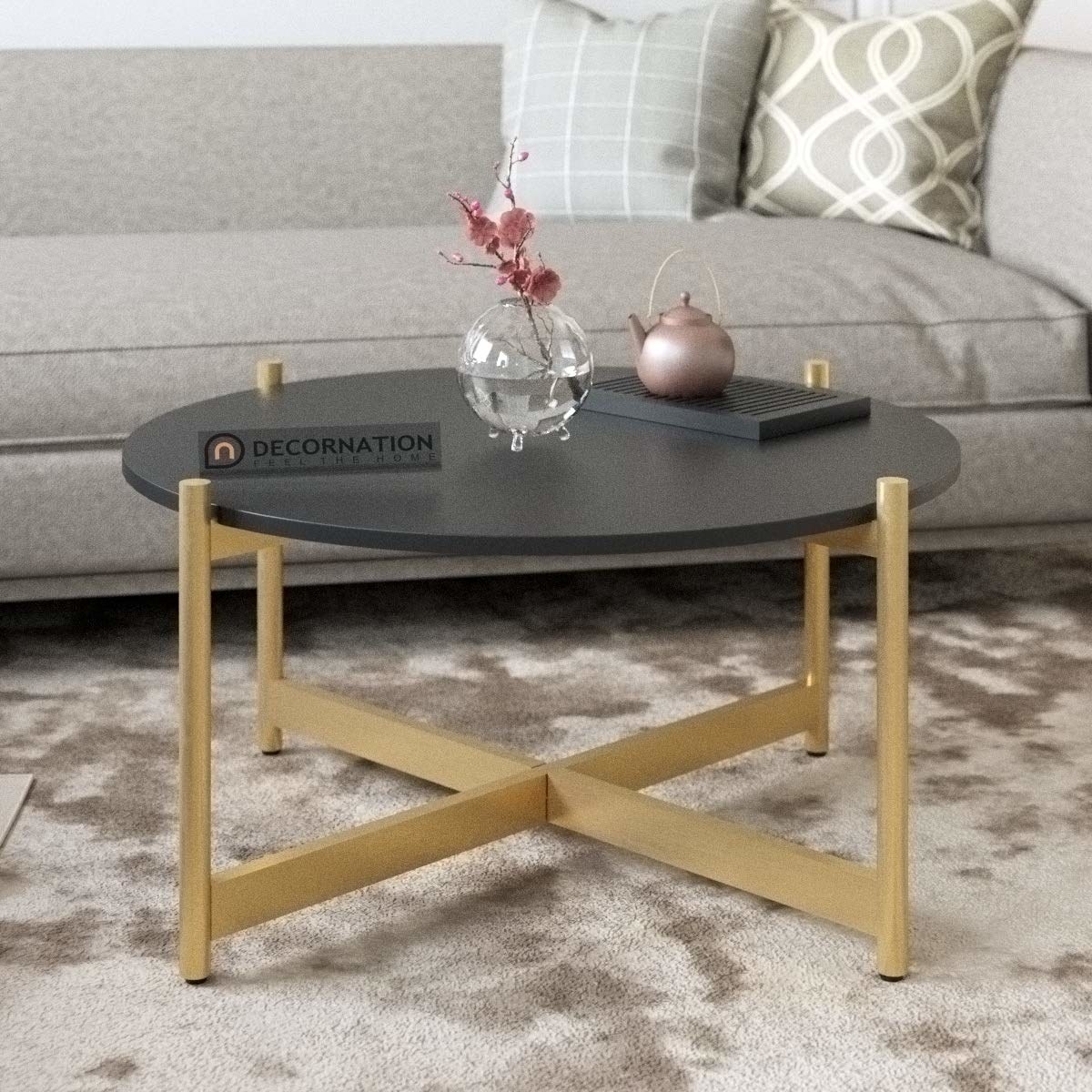 A coffee table with a black top and golden legs