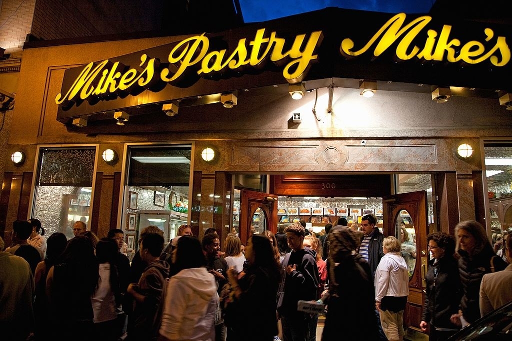 A crowd in front of &quot;Mike&#x27;s pastry&quot;