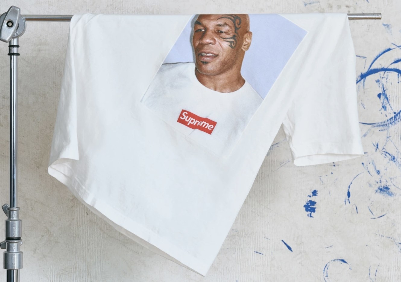 Mike Tyson Supreme T-shirt draped over a clothing rack