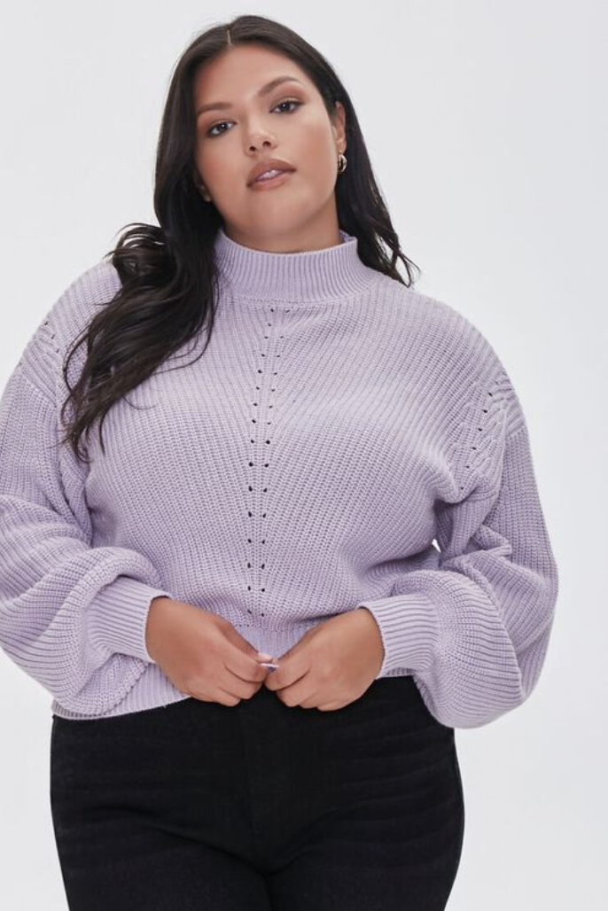a model in a lavender oversized sweater