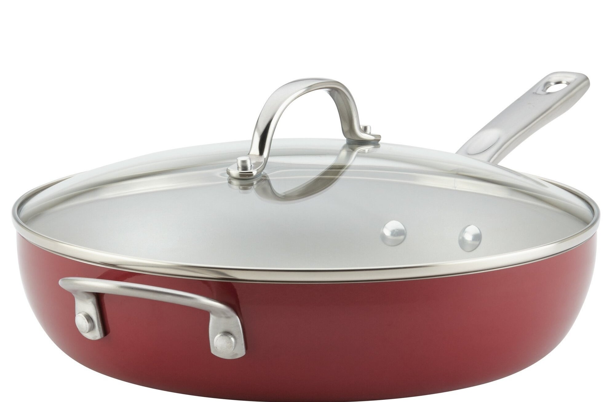 the red pan with lid on