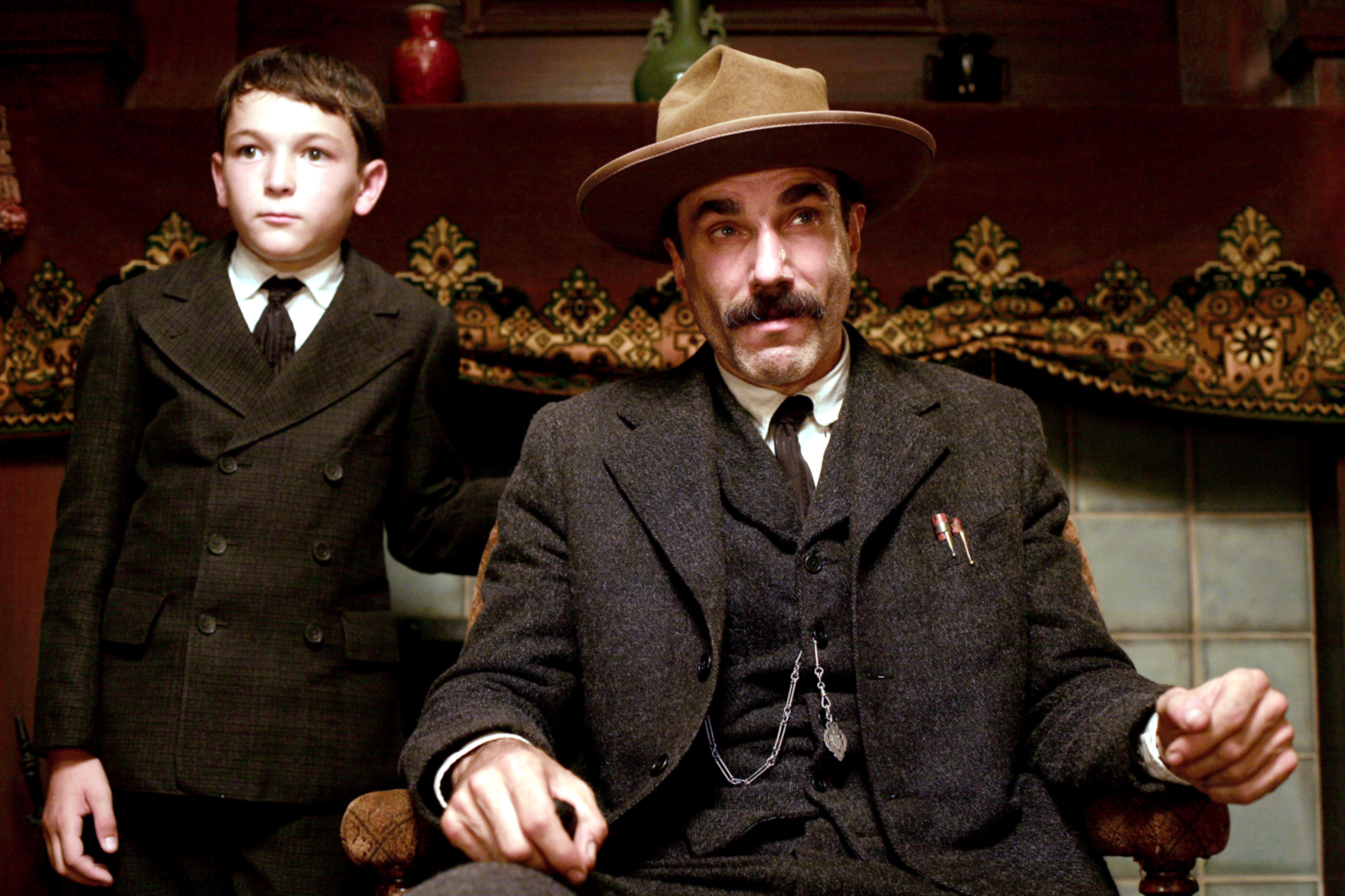 Dillon Freasier stands beside Daniel Day-Lewis