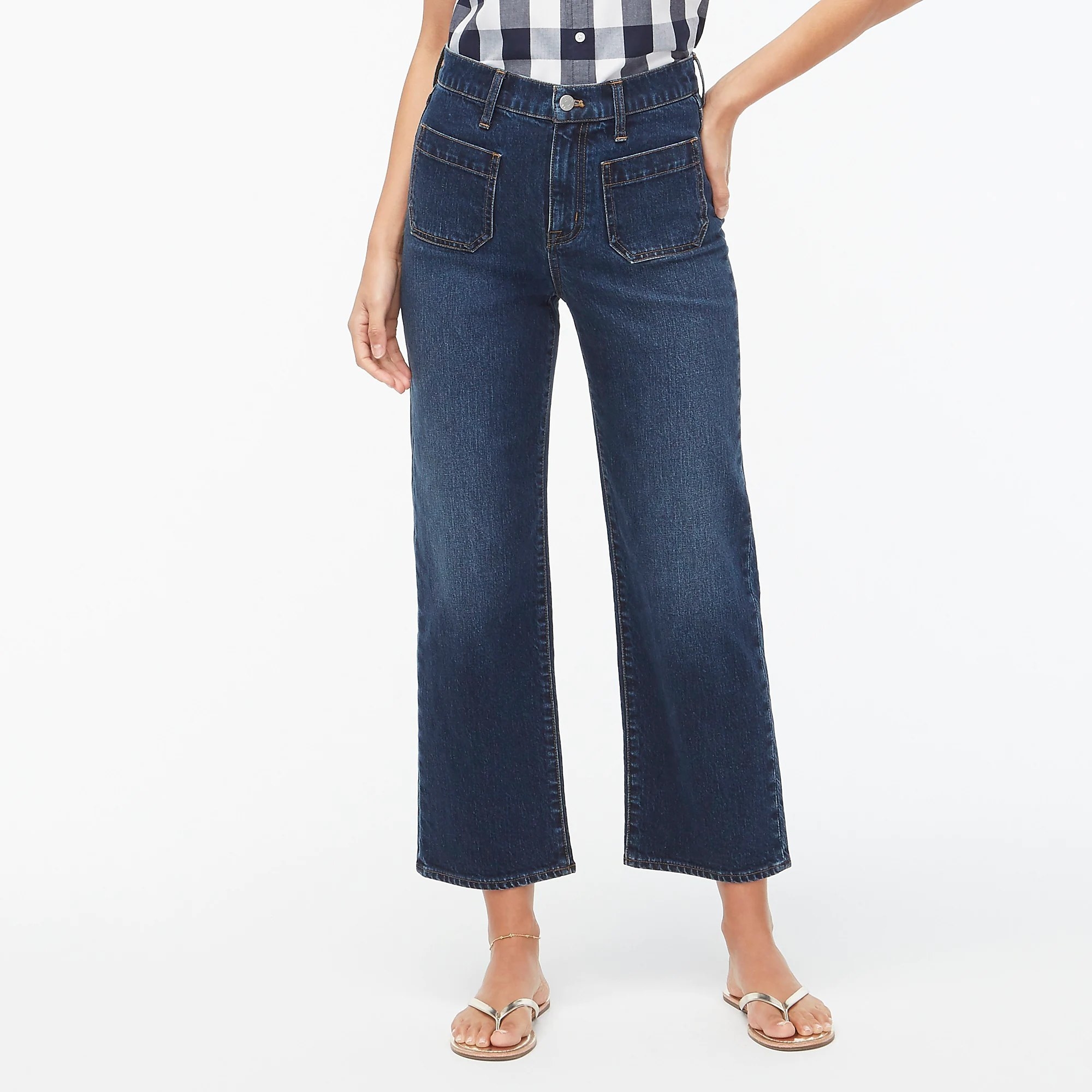 The jeans with patch pockets on the front and an increasingly wide leg