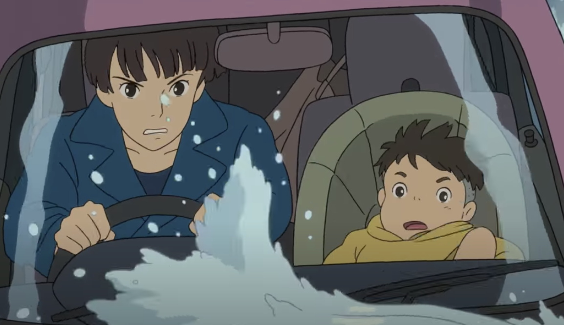 the mom driving with Ponyo through water