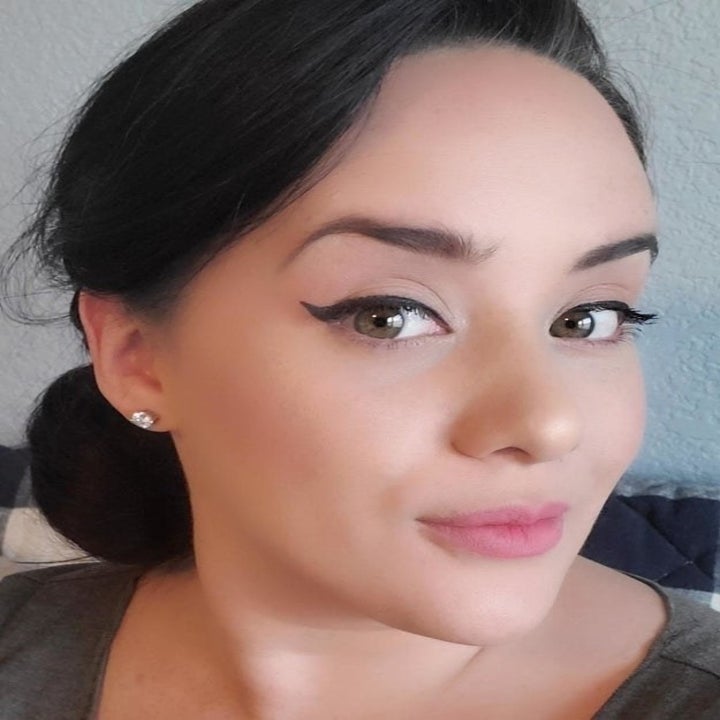 Reviewer showing results of using wing-shaped stamp