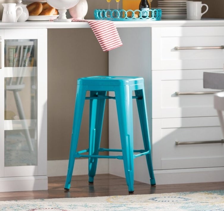 The glossy crystal-teal blue bar and counter stool