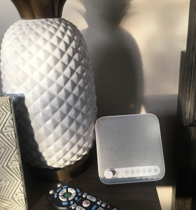 the sleep therapy sound machine on a reviewer&#x27;s nightstand