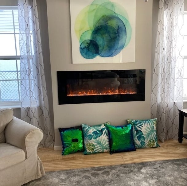 Review photo of the wall-mounted electric fireplace