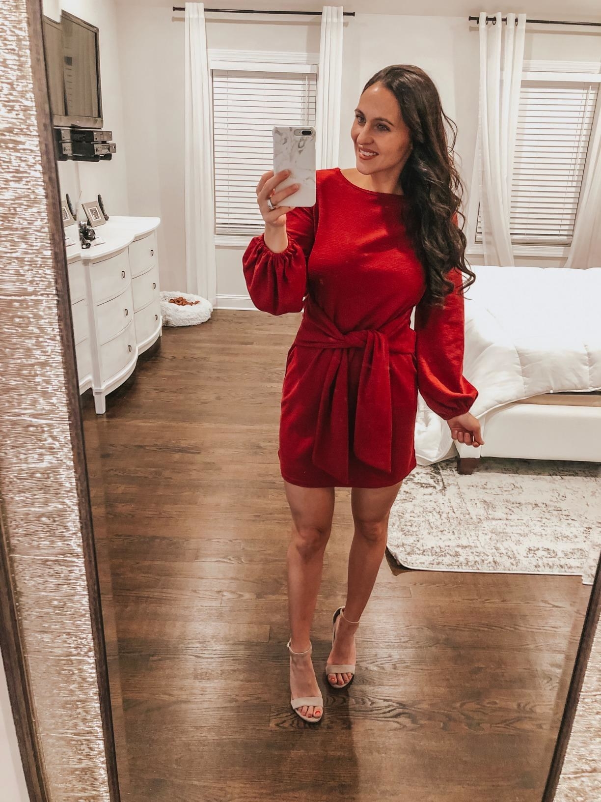 Reviewer wearing the wine red dress