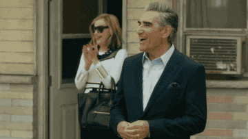 Johnny Rose and Moira Rose clapping on an episode of &quot;Schitt&#x27;s Creek&quot;