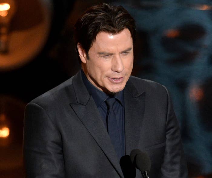 John speaks on stage at the Oscars