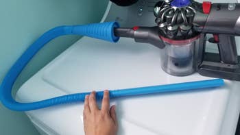 the hose attached to a dyson vacuum