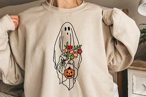 model wearing the white crewneck