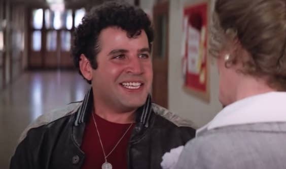 Michael Tucci talking to a teacher in &quot;Grease&quot;