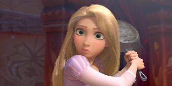 rapunzel holds a pan