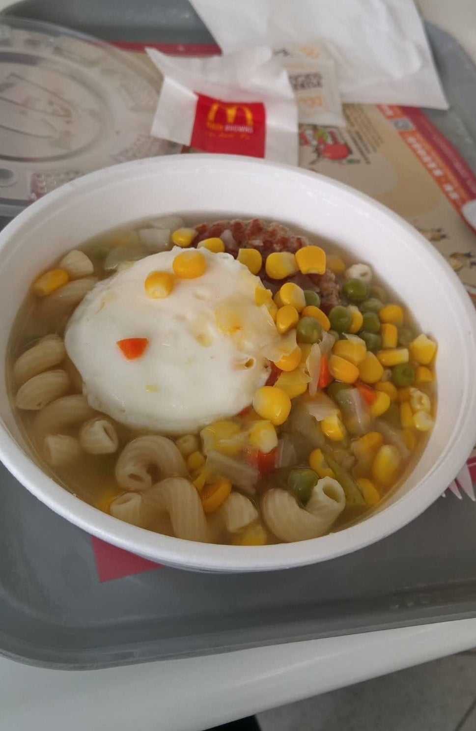 McDonald&#x27;s breakfast soup with a poached egg.