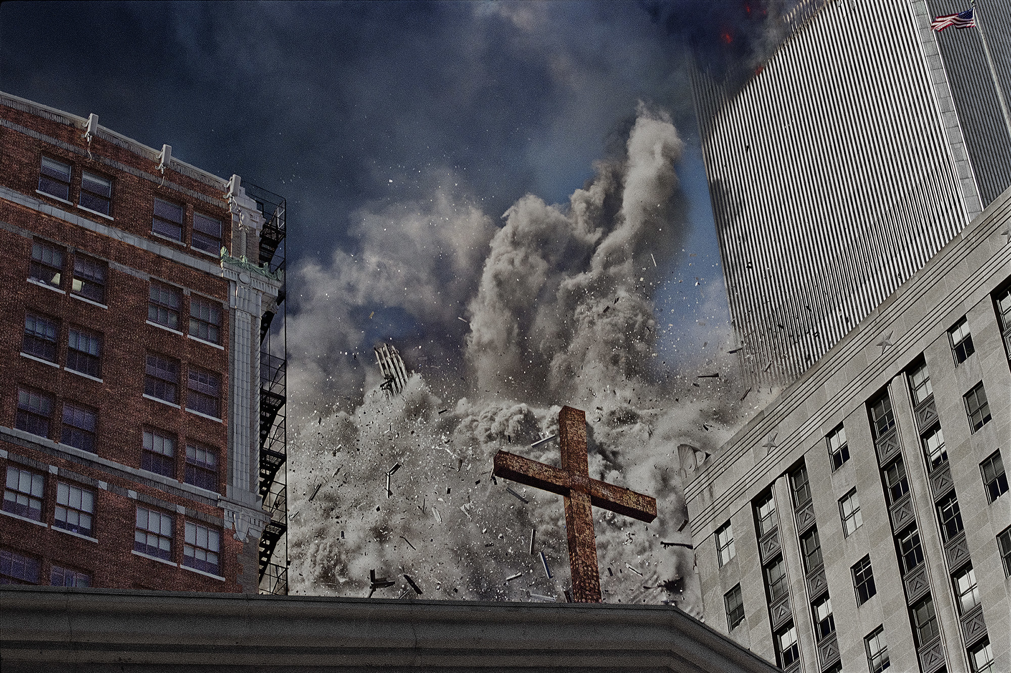 The debris from the first tower collapsing is seen behind a cross on a church 