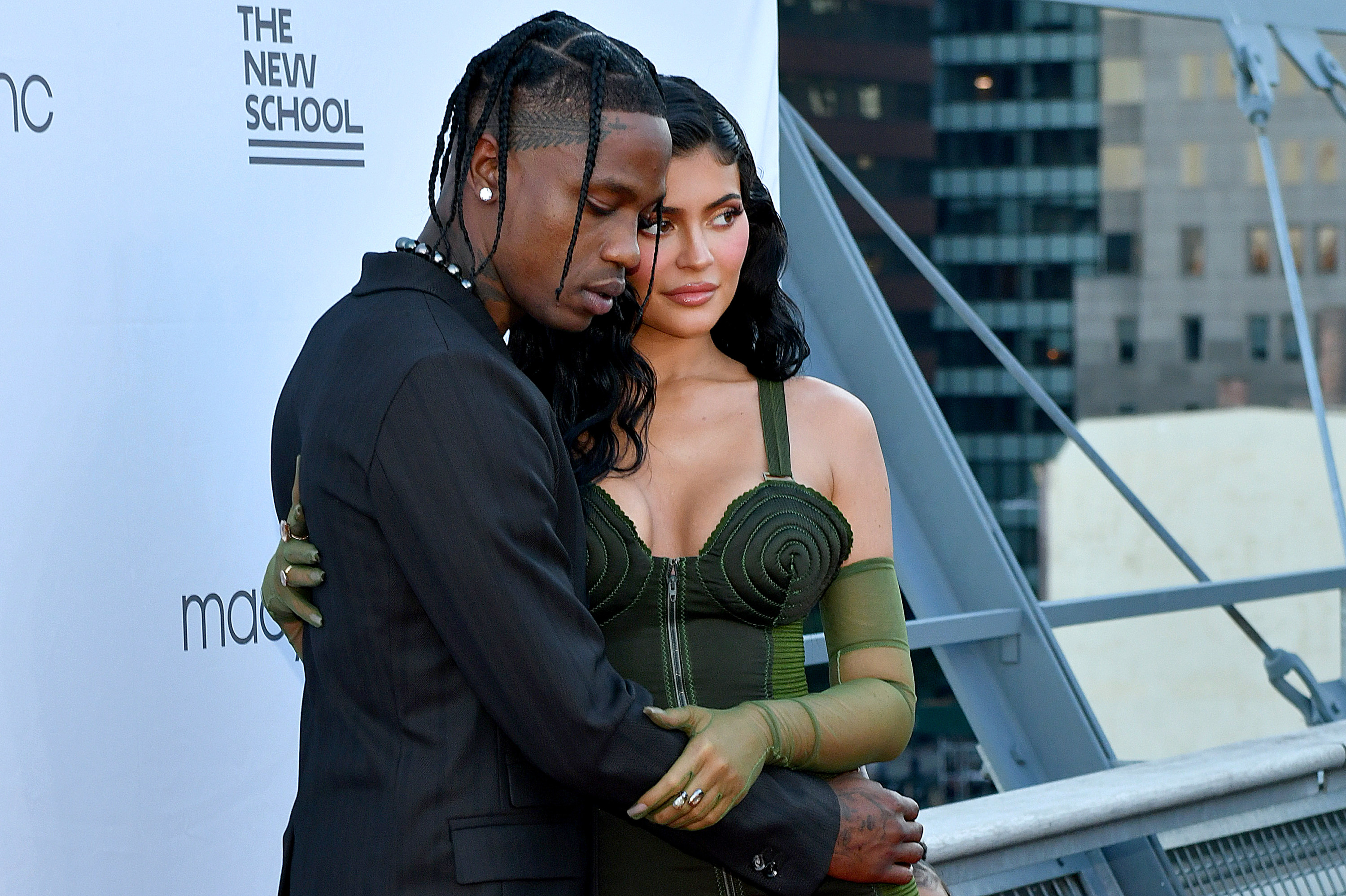 Pregnant Kylie Jenner shows off baby bump as she supports Kendall Jenner & Travis  Scott at Houston charity baseball game