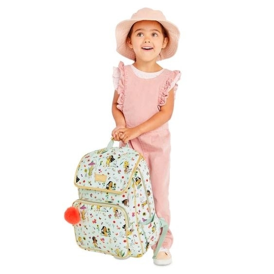 A young girl with the backpack