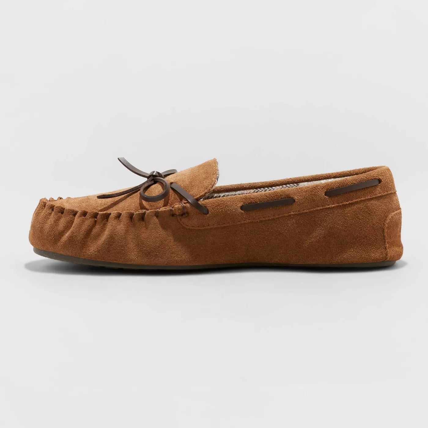A moccasin slipper with leather laces