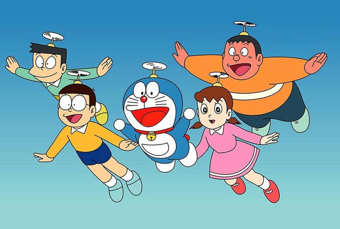 A poster of the japanese magna series Doraemon featuring the lead characters