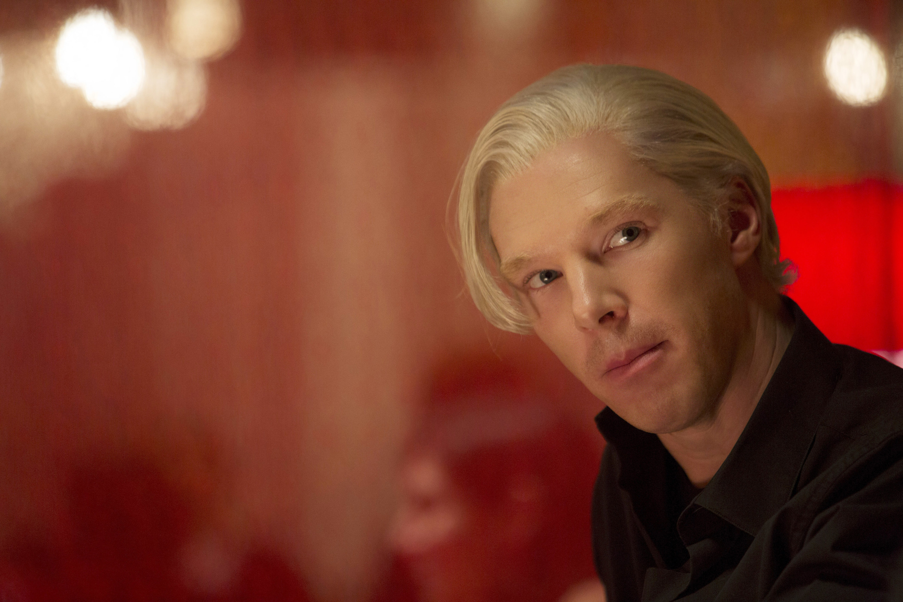 A close up of Benedict Cumberbatch in a short blonde wig