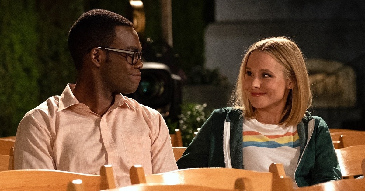 Eleanor and Chidi look into one another&#x27;s eyes, smiling with their mouth closed.