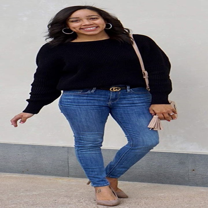 front view of a different model wearing the sweater in black