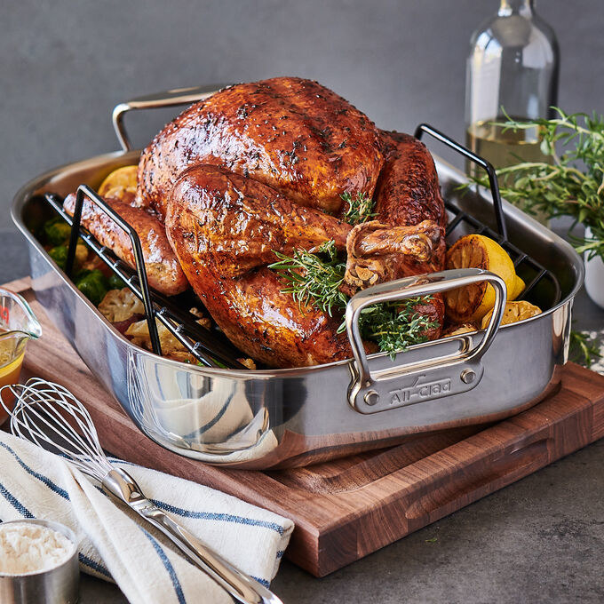 a roasted turkey with lemon and fresh herbs
