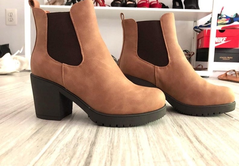 A pair of camel/pu suede chelsea ankle boots
