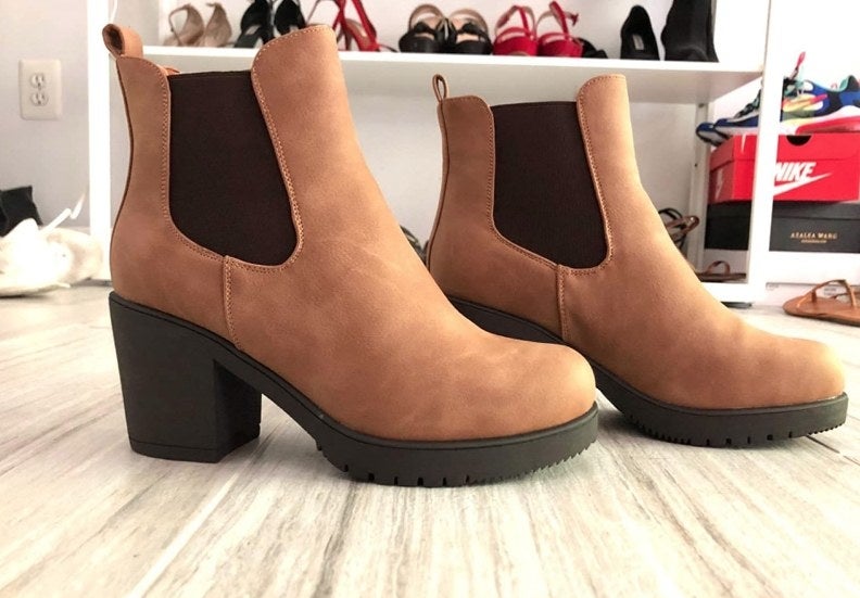 A pair of camel/pu suede chelsea ankle boots