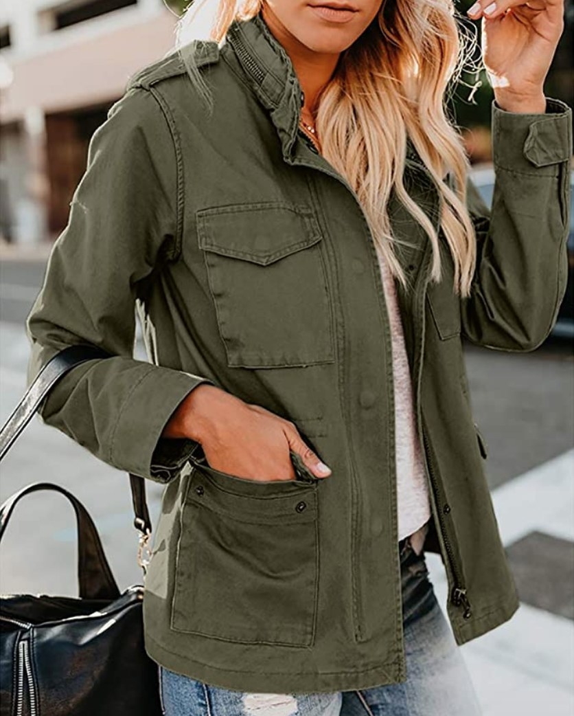 A model wearing an army green utility jacket