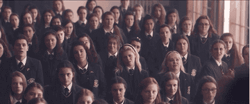 A school hall full of girls who look bored