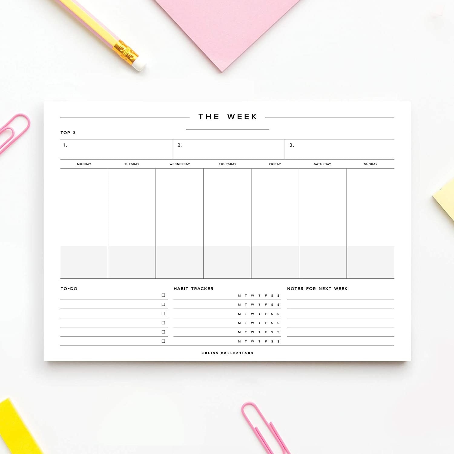 A weekly planner with a pencil next to it