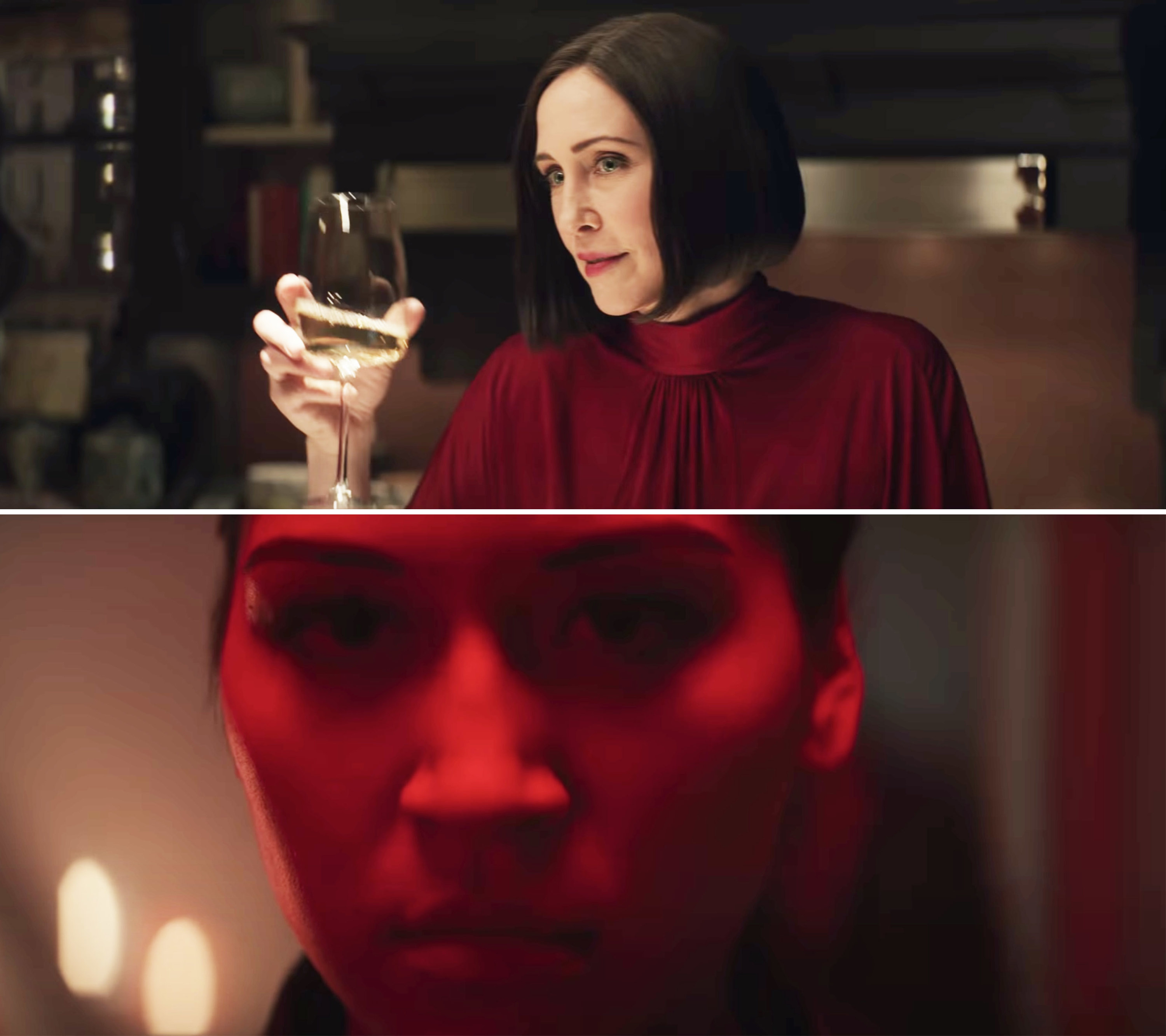 Vera holding a wine glass and Maya in close-up with red light