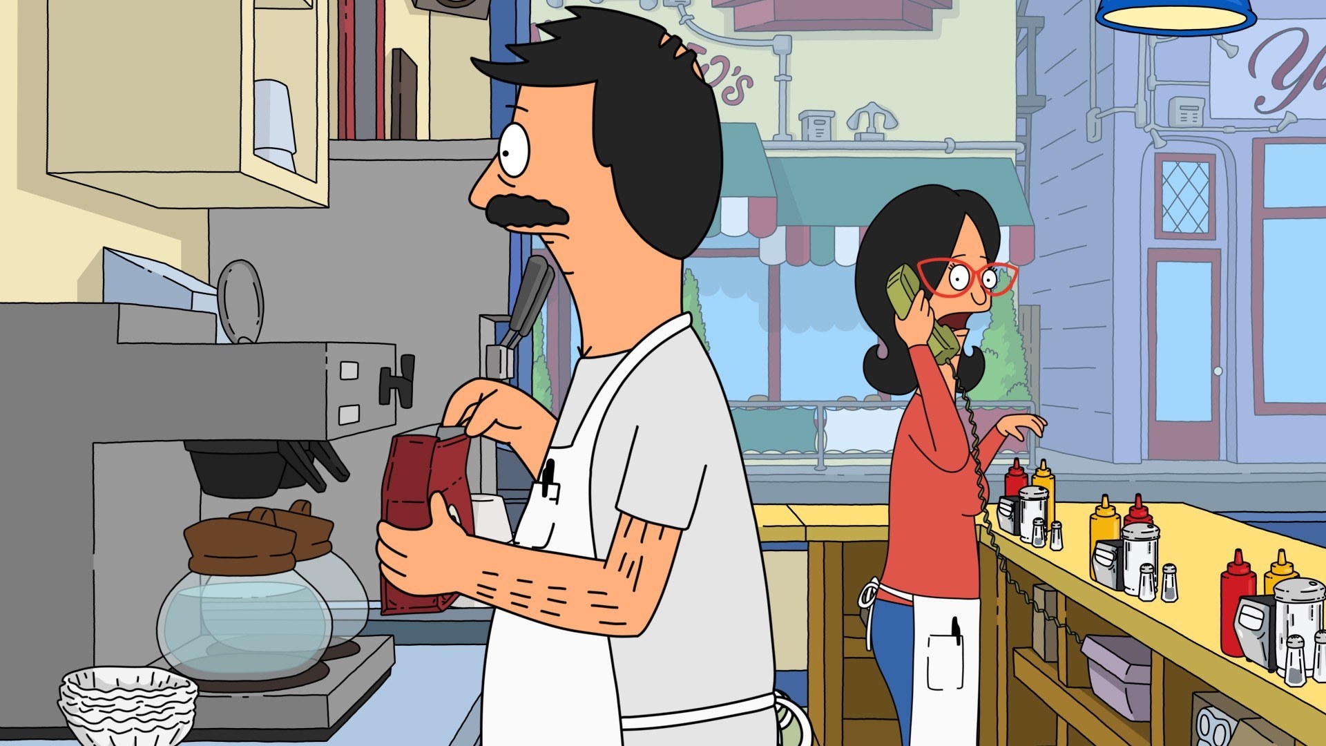 Bob and Linda Belcher stand behind the counter in their diner