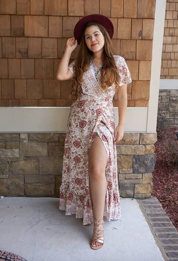 reviewer wearing the floral slit dress