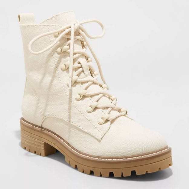 off-white boots with shoe strings, light camel colored sole